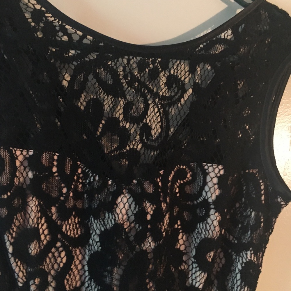 Beautiful black lace dress, natural background